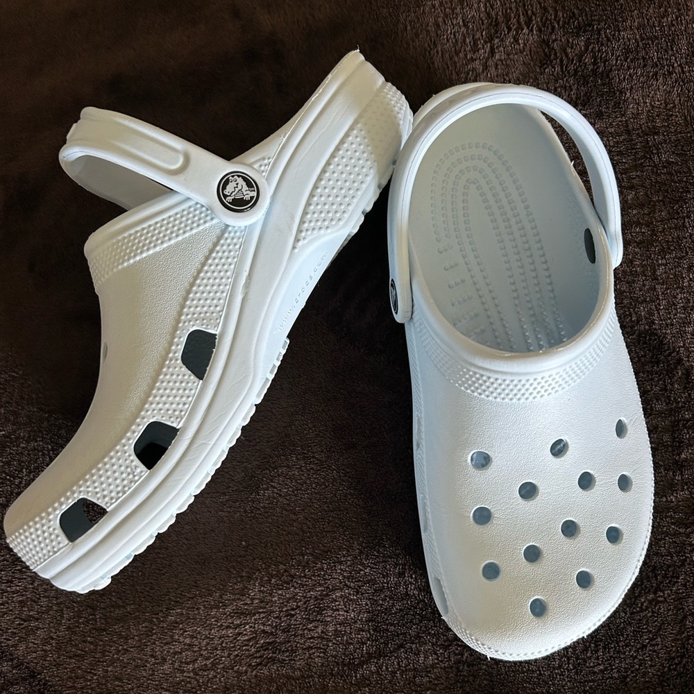 Crocs. Light blue Men’s 6 / Womens 8